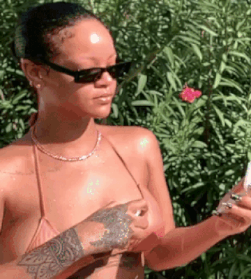 Rihanna shows sexy big boobs in bikini top 2.gif